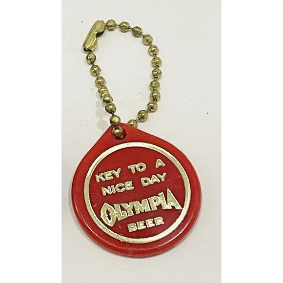 Vintage Olympia Beer Keychain Plastic Gold Red Oly Key Chain Key To A Nice Day - Picture 1 of 3